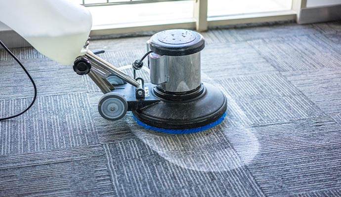 Commercial carpet cleaning using equipment