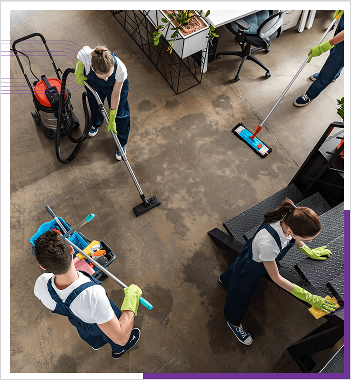 A person is cleaning a commercial space floor.