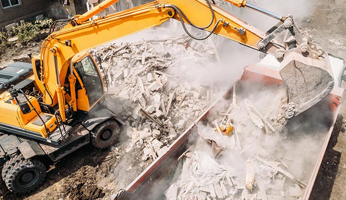 Construction waste cleaning with excavator