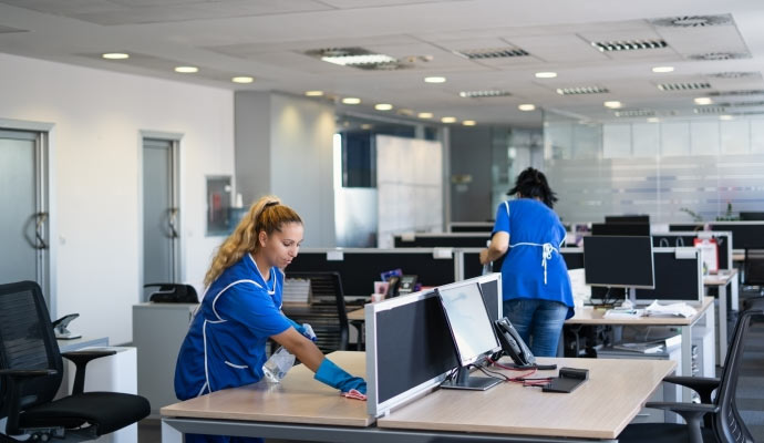 Professional team cleaning office